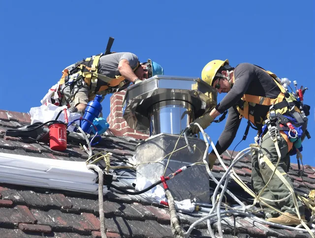 Protective chimney cap installed by Vernon Chimney Sweep in Vernon, CT
